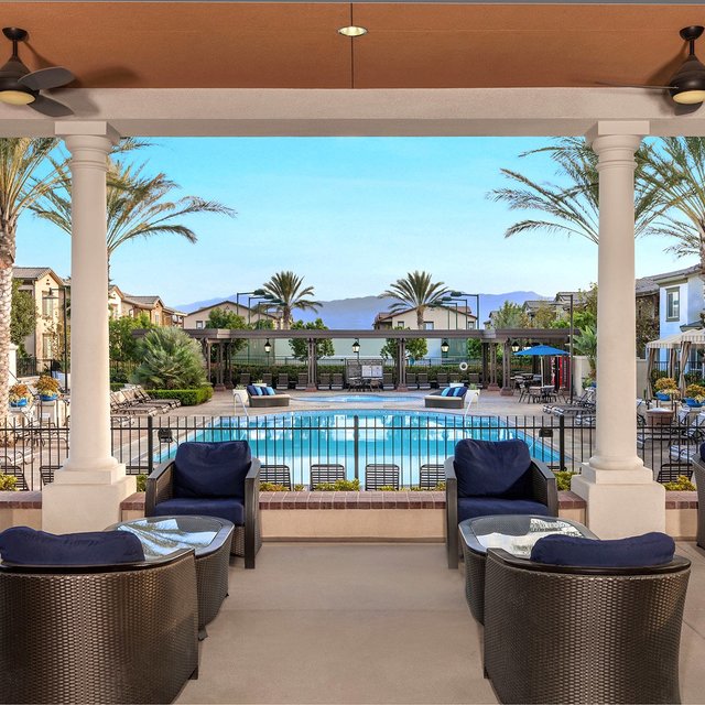 Homecoming at the Preserve Apartments - Pool seating area