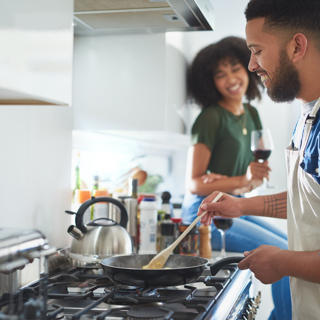 Homecoming At The Resort - Happy Couple Cooking in the Kitchen